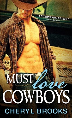 Muscular Cowboy with unbuttoned shirt leaving his chest bare